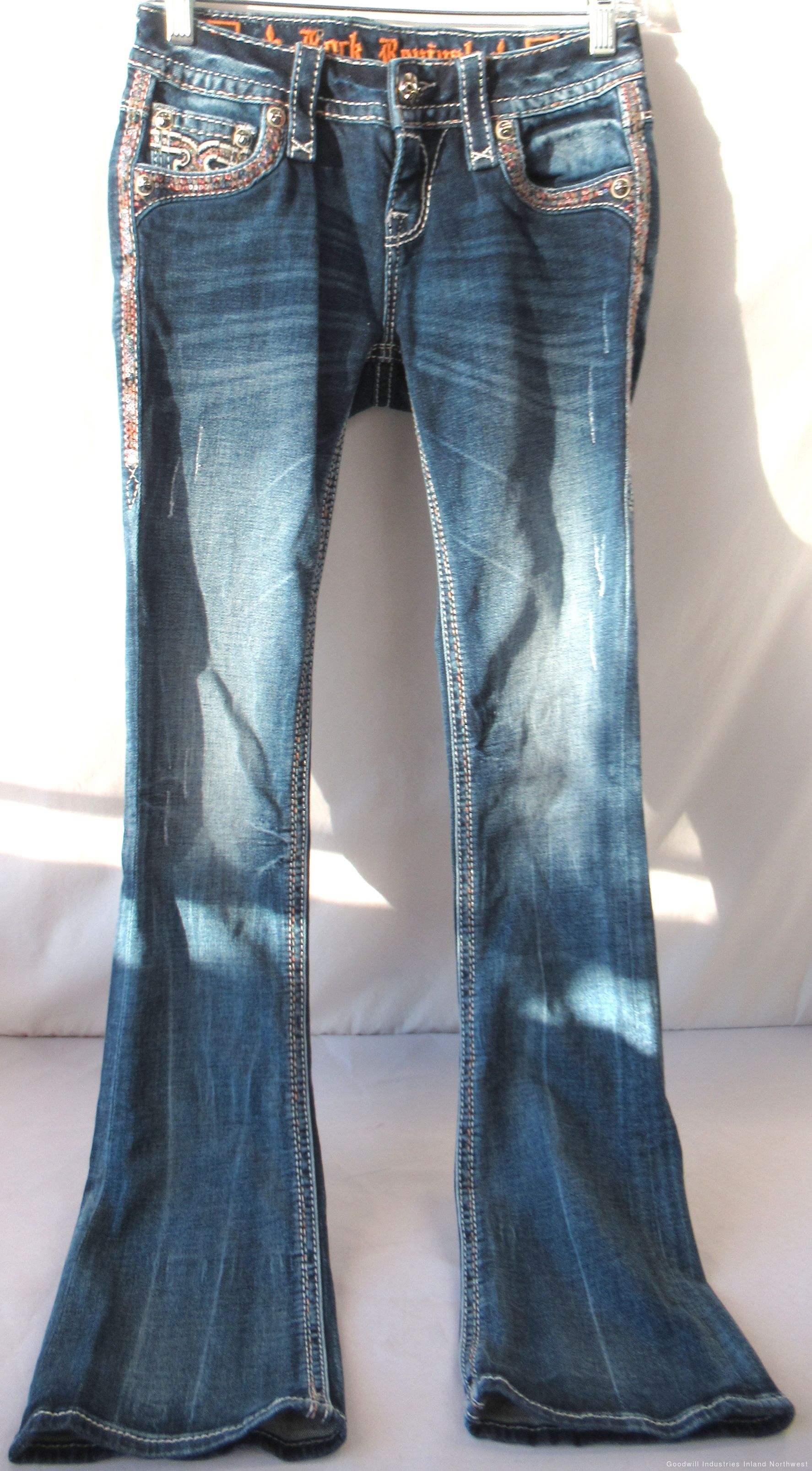 dark blue rock revival jeans